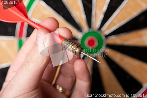 Image of Hand Holding a Dart