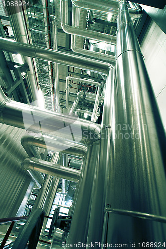 Image of Industrial zone, Steel pipelines in blue tones  