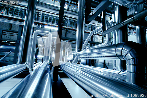 Image of Industrial zone, Steel pipelines in blue tones  