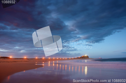 Image of lighthouse and breakwater at night