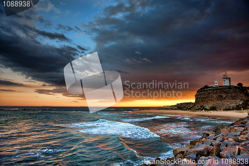 Image of lighthouse and ocean sunset