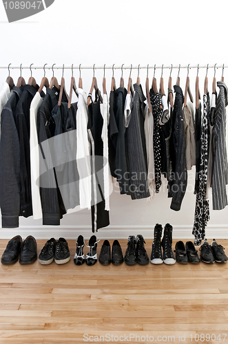 Image of Black and white clothes and shoes