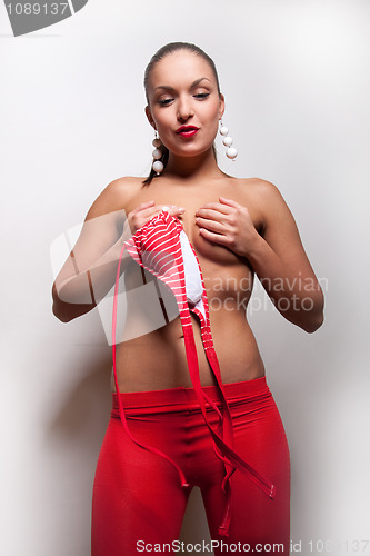 Image of attractive girl in red swimsuit