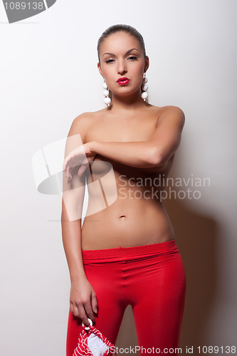 Image of attractive girl in red swimsuit