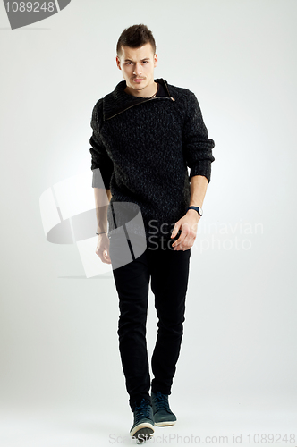 Image of walking male model
