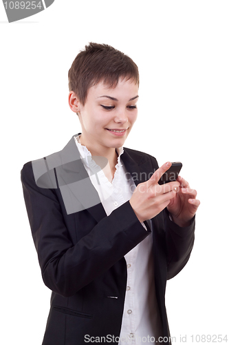 Image of business woman texting on phone