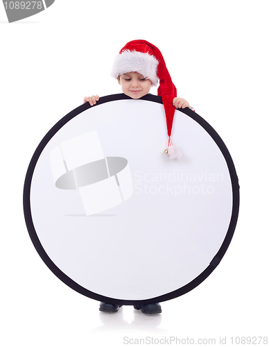 Image of santa kid holding a sign