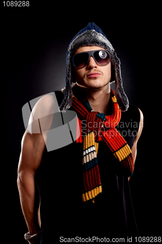 Image of man in winter clothes and sunglasses