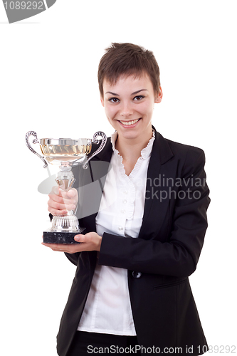 Image of  business woman holding a silver cup
