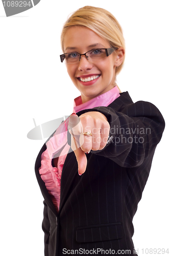 Image of Smiling business woman pointing 