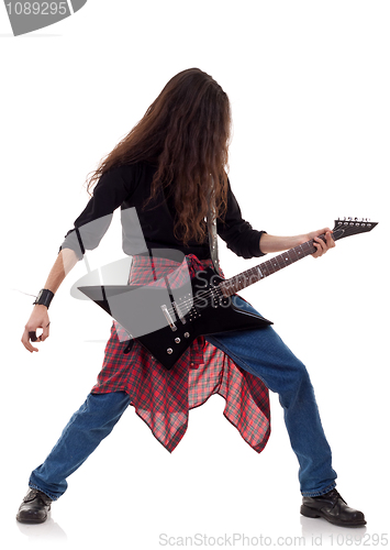 Image of performer with an electric guitar 