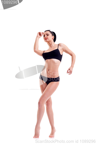 Image of bikini model stanting on white  background