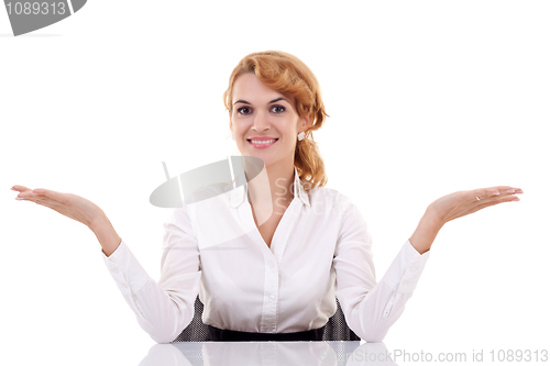 Image of business woman behind the desk 