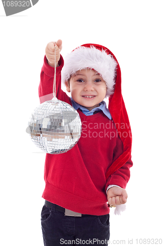 Image of santa kid holding a disco ball