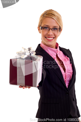 Image of Happy business woman with gift