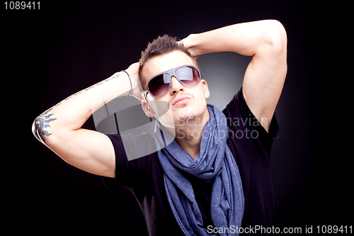 Image of relaxed young fashion guy