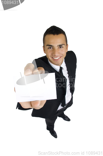 Image of business card in the hand of business man