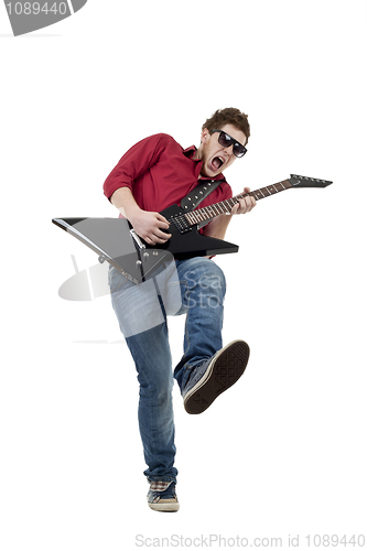 Image of musician playing the guitar