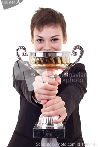 Image of woman winning a gold trophy 