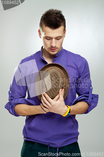 Image of handsome caucasian man praying