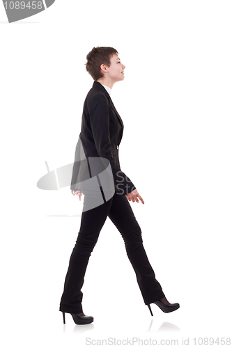 Image of business woman is walking