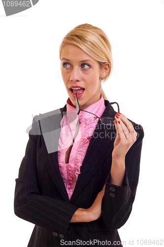 Image of Thoughtful business woman with glasses