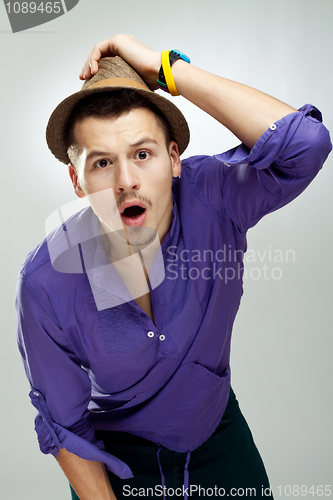 Image of shocked young fashion man