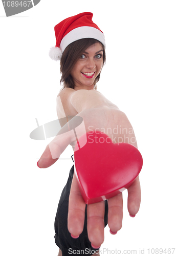 Image of santa girl taking a heart