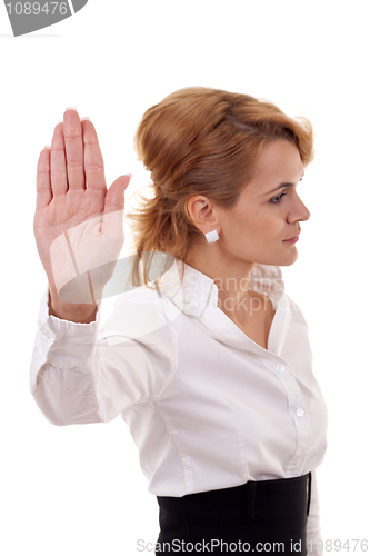 Image of business woman making stop