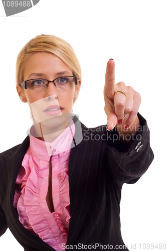 Image of Young business woman pointing