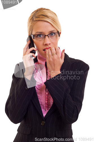 Image of A business woman worries