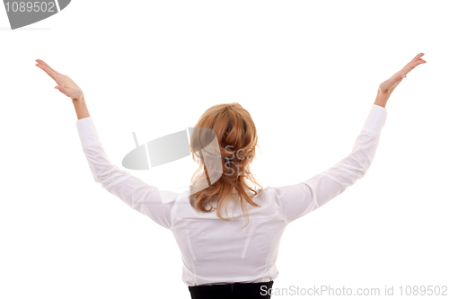 Image of woman with her hands in the air 