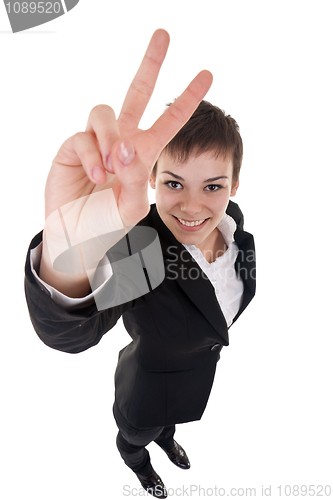 Image of woman making her victory sign 