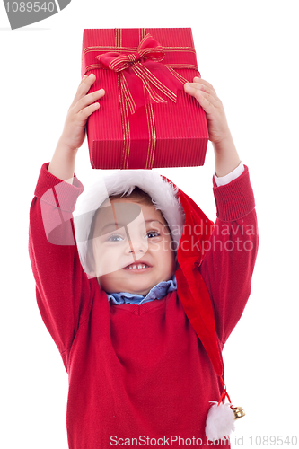 Image of boy stretches out a present