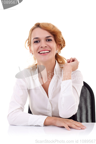 Image of  woman sitting at her desk