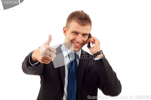 Image of business man showing thumb up