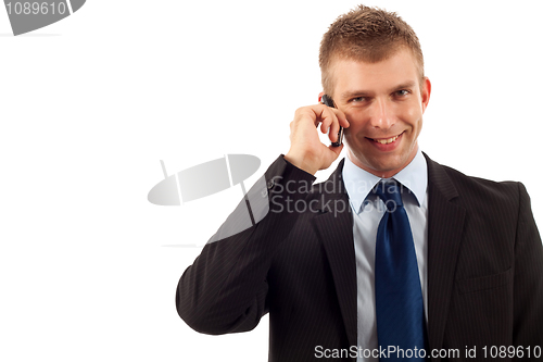 Image of Business man making a phone call 
