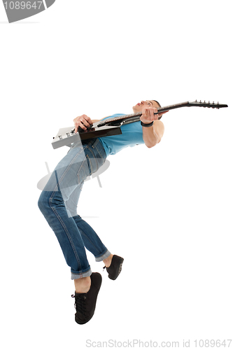 Image of rock star playing with passion
