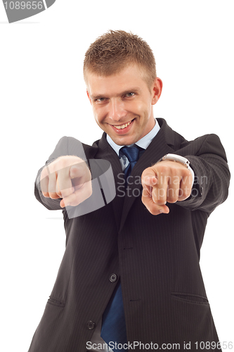 Image of  business man pointing to the camera 