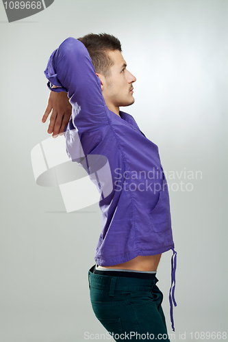 Image of fahion young man posing in studio