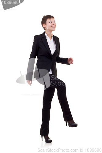 Image of woman stepping on imaginary step