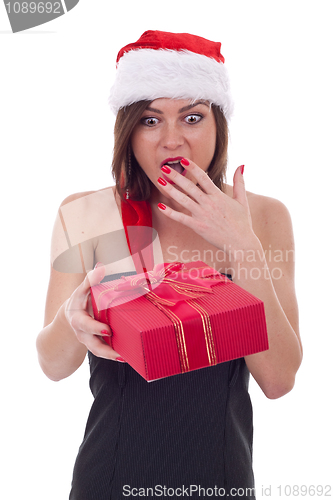 Image of Surprised woman with santa hat