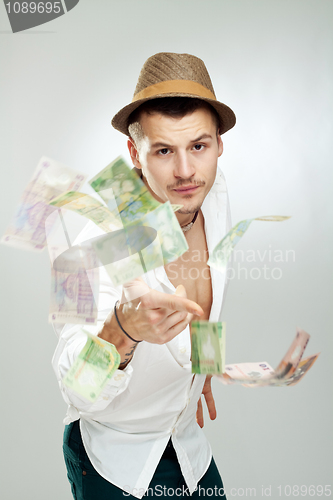 Image of throwing Money Into Air