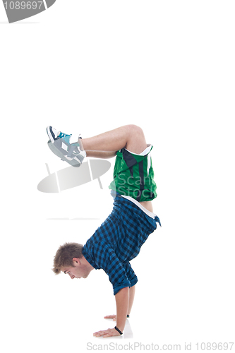 Image of Young bboy standing on hands