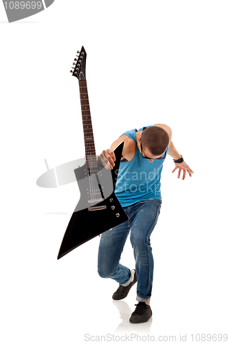 Image of rock star holding an electric guitar