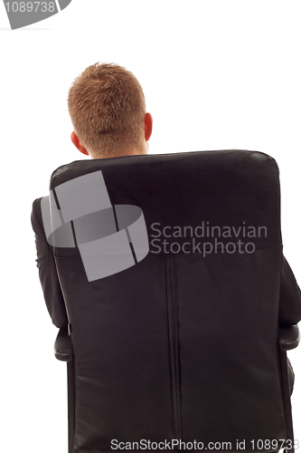 Image of businessman back seated