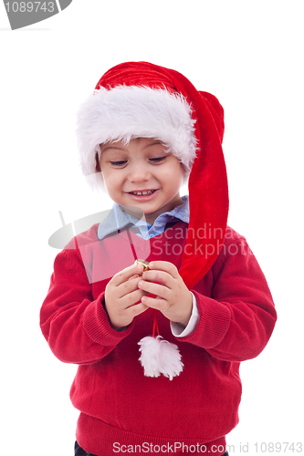 Image of Santa kid playing with his cap