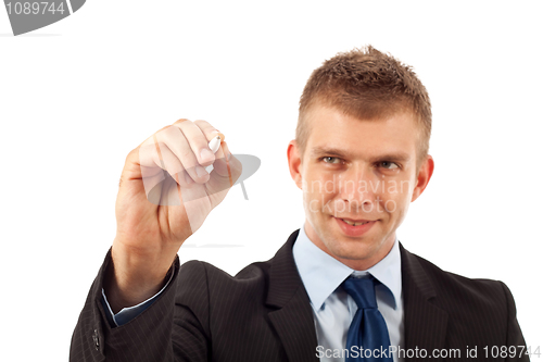 Image of male hand with pen ready to write