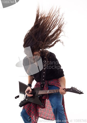 Image of headbanging guitarist