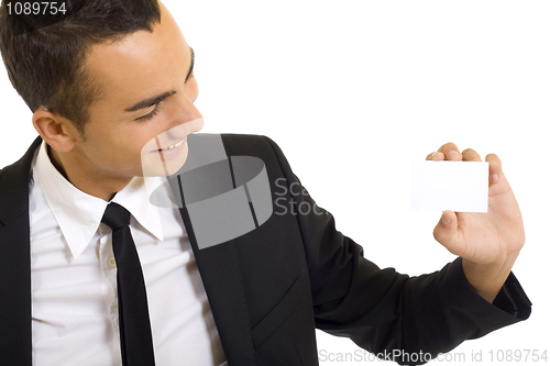 Image of young man with blank business card